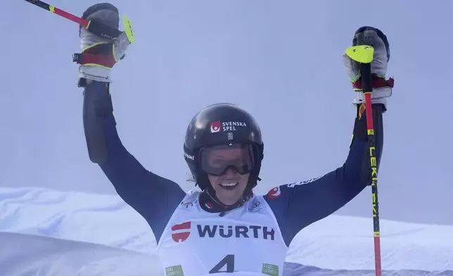 Sweden's Sara Hector reacts after winning an alpine ski, women's World Cup giant slalom race in Kranjska Gora, Slovenia, Saturday, Jan. 4, 2025. (AP Photo/Giovanni Auletta)