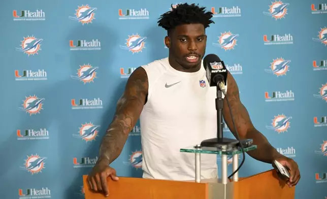 Miami Dolphins wide receiver Tyreek Hill speaks during a news conference after an NFL football game against the Cleveland Browns Sunday, Dec. 29, 2024, in Cleveland. (AP Photo/David Richard)