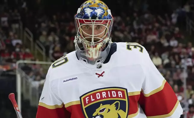 Florida Panthers goaltender Spencer Knight skates during the second period of an NHL hockey game against the New Jersey Devils, Tuesday, Jan. 14, 2025, in Newark, N.J. (AP Photo/Julia Demaree Nikhinson)