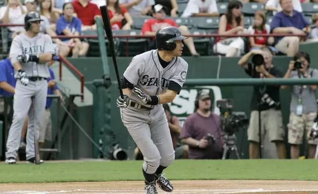 FILE - Seattle Mariners' Ichiro Suzuki follows through after hitting his 3,000th career hit in the first inning of a baseball game against the Texas Rangers, Tuesday, July 29, 2008, in Arlington, Texas.(AP Photo/Matt Slocum, File)