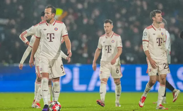 Bayern players react after Feyenoord's Ayase Ueda scoring his side's third goal during the Champions League opening phase soccer match between Feyenoord and Bayern Munich, at De Kuip Stadium, in Rotterdam, Netherlands, Wednesday, Jan. 22, 2025. (AP Photo/Peter Dejong)