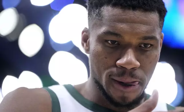 Milwaukee Bucks' Giannis Antetokounmpo pauses before an NBA basketball game against the Brooklyn Nets Thursday, Jan. 2, 2025, in Milwaukee. (AP Photo/Morry Gash)