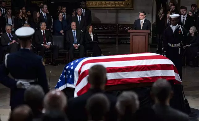 Speaker of the House Mike Johnson of Louisiana, speaks during a ceremony as the flag-draped casket of former President Jimmy Carter lies in state, at the Capitol, Tuesday, Jan. 7, 2025, in Washington. Carter died Dec. 29 at the age of 100. (Kent Nishimura/The New York Times via AP, Pool)