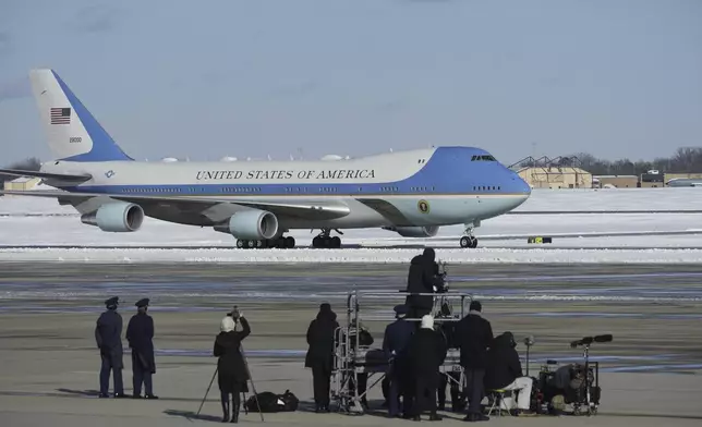 A military aircraft carrying the casket of former President Jimmy Carter, taxiing after touching down at Joint Base Andrews, Md., Tuesday, Jan. 7, 2025. (AP Photo/Steve Helber)