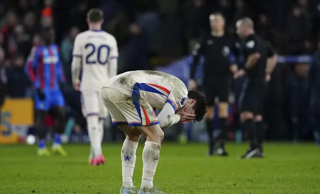 Chelsea's Pedro Neto reacts after the English Premier League soccer match between Crystal Palace and Chelsea in London, Saturday, Jan. 4, 2025. (AP Photo/Dave Shopland)