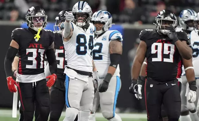 Carolina Panthers tight end Feleipe Franks celebrates during the first half of an NFL football game against the Atlanta Falcons, Sunday, Jan. 5, 2025, in Atlanta. (AP Photo/Brynn Anderson)