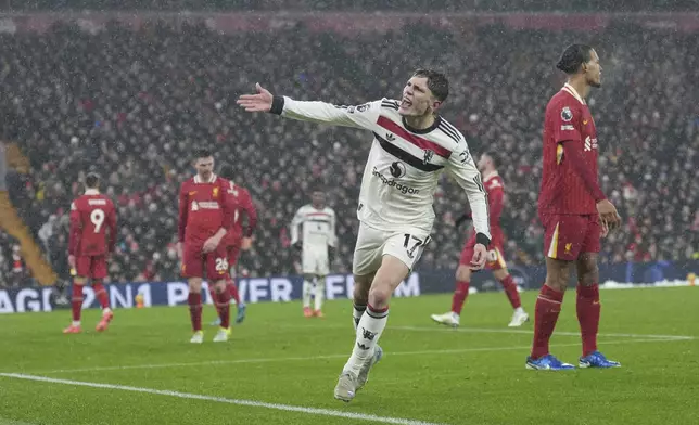 Manchester United's Alejandro Garnacho gestures during the English Premier League soccer match against Liverpool at the Anfield stadium in Liverpool, England, Sunday, Jan. 5, 2025. (AP Photo/Jon Super)