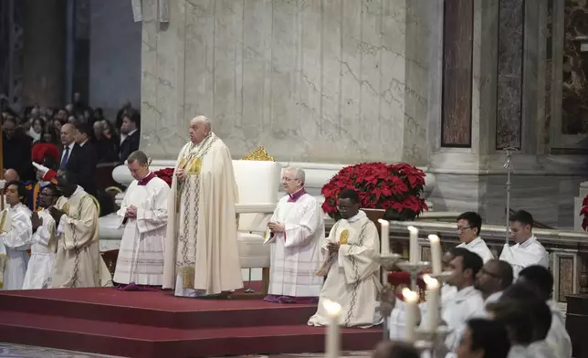 Pope Francis presides over a mass in St. Peter's Basilica at The Vatican on New Year's Day, Wednesday, Jan. 1, 2025. (AP Photo/Andrew Medichini)