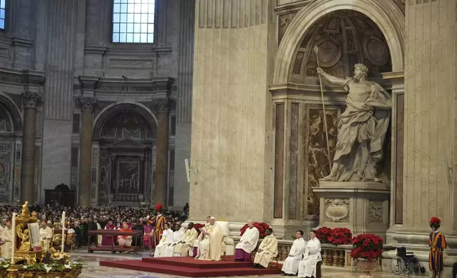 Pope Francis delivers his homily during a mass in St. Peter's Basilica at The Vatican on New Year's Day, Wednesday, Jan. 1, 2025. (AP Photo/Andrew Medichini)