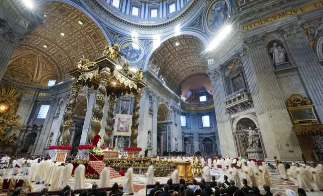 Pope Francis presides over a mass in St. Peter's Basilica at The Vatican on New Year's Day, Wednesday, Jan. 1, 2025. (AP Photo/Andrew Medichini)