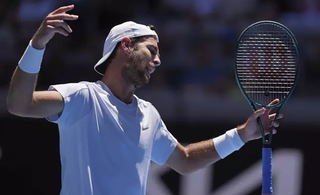 Karen Khachanov of Russia reacts during his third round match against Alex Michelsen of the U.S. at the Australian Open tennis championship in Melbourne, Australia, Saturday, Jan. 18, 2025. (AP Photo/Ng Han Guan)