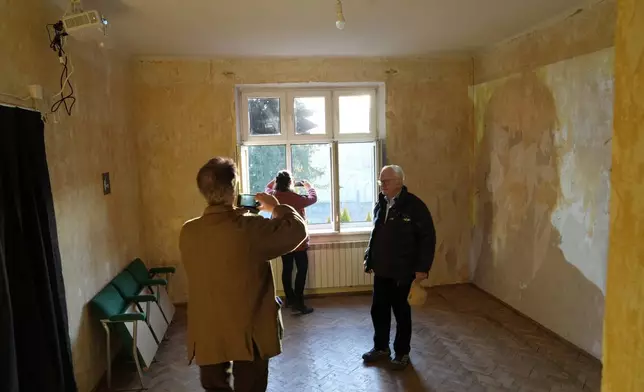 A view onto the Auschwitz-Birkenau State Museum can be seen from the former house of Auschwitz commandant Rudolf Höss, in Oswiecim, Poland, on Sunday Jan. 26, 2025. (AP Photo/Czarek Sokolowski)