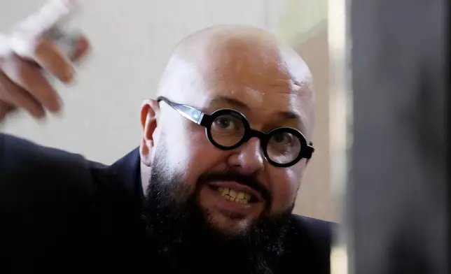 Jacek Purski, the director of the Auschwitz Center on Hate, Extremism and Radicalization, speaks to reporters in Oswiecim, Poland, on Sunday Jan. 26, 2025. (AP Photo/Czarek Sokolowski)