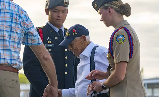 FILE - Pearl Harbor survivor Harry Chandler, 102, of Tequesta, Fla., attends the 82nd Pearl Harbor Remembrance Day ceremony on Dec. 7, 2023, at Pearl Harbor in Honolulu. (AP Photo/Mengshin Lin, File)