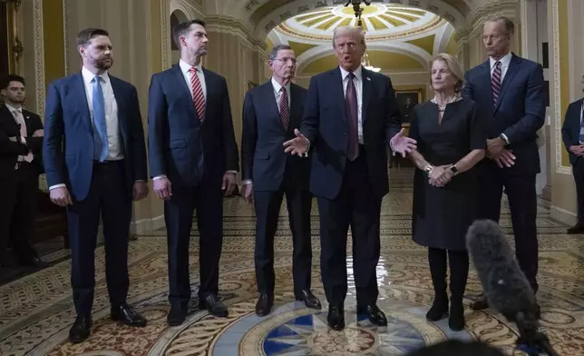 President-elect Donald Trump flanked by from left, Vice President-elect Sen. JD Vance, R-Ohio, Sen. Tom Cotton, R-Ark., Sen. John Barrasso, R-Wyo., Sen. Shelley Moore Capito, R-W.Va., and Senate Majority Leader John Thune of S.D. talks to reporters after a meeting with Republican leadership at the Capitol on Wednesday, Jan. 8, 2025, in Washington. (AP Photo/Jose Luis Magana)