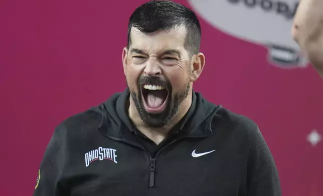 Ohio State head coach Ryan Day celebrates after the Cotton Bowl College Football Playoff semifinal game against Texas, Friday, Jan. 10, 2025, in Arlington, Texas. (AP Photo/Julio Cortez)