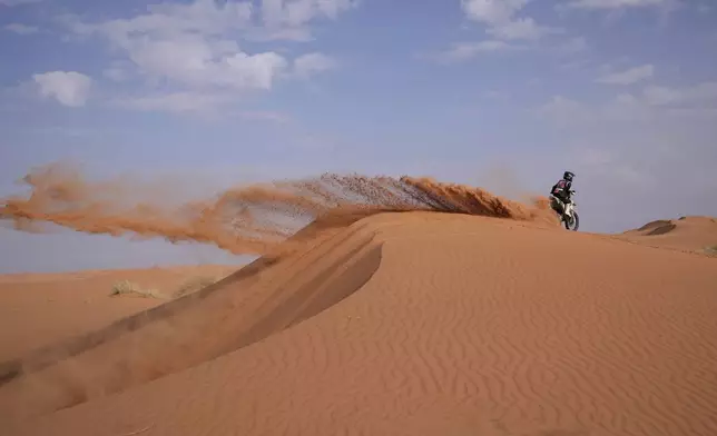 Rider Juan Puga competes during the sixth stage of the Dakar Rally between Hail and Al Duwadimi, Saudi Arabia, Saturday, Jan. 11, 2025. (AP Photo/Christophe Ena)
