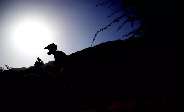 Rider Jeremy Miroir of France competes during the third stage of the Dakar Rally between Bisha and Al-Henakiyah, Saudi Arabia, Tuesday, Jan. 7, 2025. (AP Photo/Christophe Ena)
