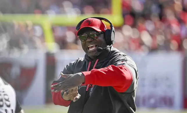 Tampa Bay Buccaneers head coach Todd Bowles calls out from the bench during the first half of an NFL football game against the New Orleans Saints Sunday, Jan. 5, 2025, in Tampa, Fla. (AP Photo/Jason Behnken)