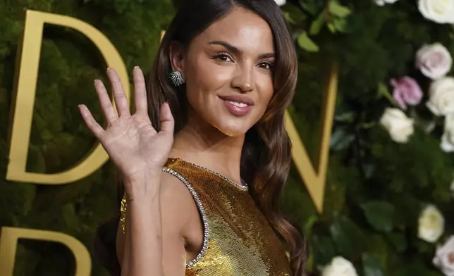 Eiza Gonzalez arrives at the 82nd Golden Globes on Sunday, Jan. 5, 2025, at the Beverly Hilton in Beverly Hills, Calif. (Photo by Jordan Strauss/Invision/AP)