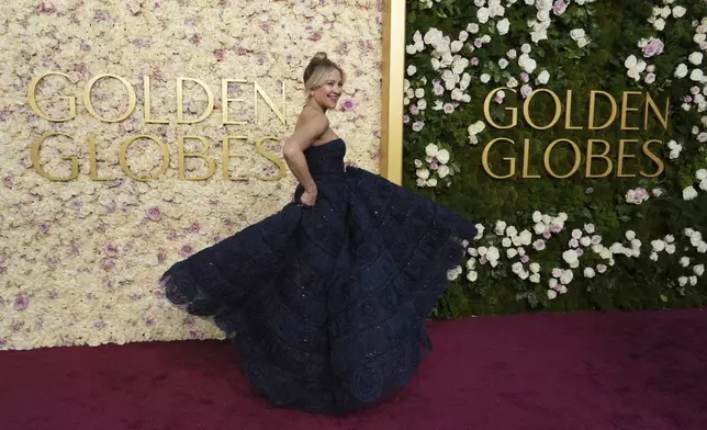 Kate Hudson arrives at the 82nd Golden Globes on Sunday, Jan. 5, 2025, at the Beverly Hilton in Beverly Hills, Calif. (Photo by Jordan Strauss/Invision/AP)