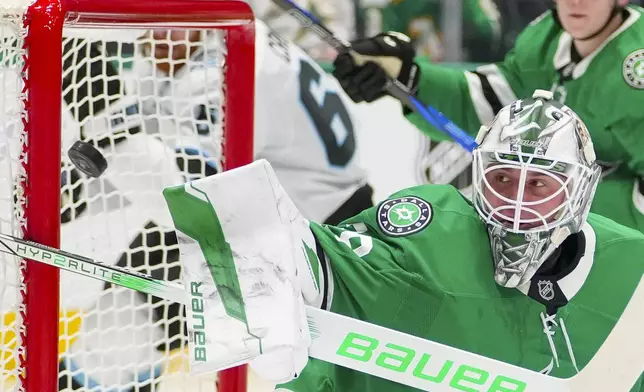 A shot by Utah Hockey Club left wing Matias Maccelli gets by Dallas Stars goaltender Jake Oettinger for a goal during the second period of an NHL hockey game, Saturday, Jan. 4, 2025, in Dallas. (AP Photo/Julio Cortez)