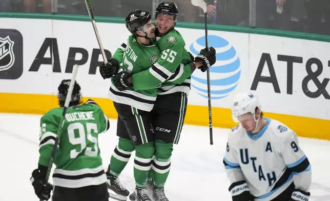 Dallas Stars defenseman Thomas Harley (55) celebrates his game-winning goal with center Wyatt Johnston and center Matt Duchene as Utah Hockey Club defenseman Mikhail Sergachev (98) skates away after during overtime of an NHL hockey game, Saturday, Jan. 4, 2025, in Dallas. The Stars won 3-2 in overtime. (AP Photo/Julio Cortez)