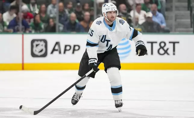 Utah Hockey Club center Alexander Kerfoot skates against the Dallas Stars during the second period of an NHL hockey game, Saturday, Jan. 4, 2025, in Dallas. (AP Photo/Julio Cortez)