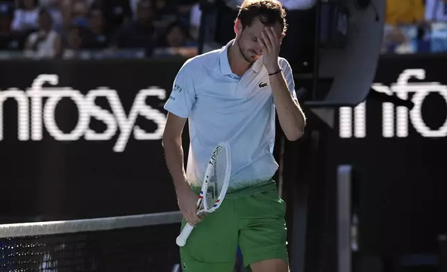 Daniil Medvedev of Russia reacts during his first round match against Kasidit Samrej of Thailand at the Australian Open tennis championship in Melbourne, Australia, Tuesday, Jan. 14, 2025. (AP Photo/Ng Han Guan)