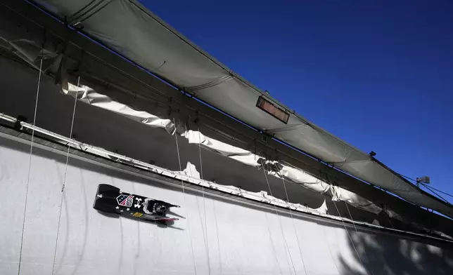 Kaysha Love, of the United States, competes in the women's monobob at the Bobsleigh World Cup in Innsbruck, Austria, Saturday, Jan. 18, 2025. (AP Photo/Matthias Schrader)