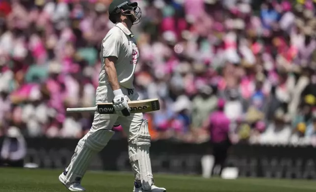 Australia's Steve Smith reacts after he was dismissed during play on the third day of the fifth cricket test between India and Australia at the Sydney Cricket Ground, in Sydney, Australia, Sunday, Jan. 5, 2025. (AP Photo/Mark Baker)