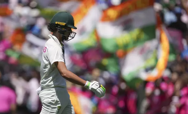 Australia's Sam Konstas walks from the field after was dismissed during play on the third day of the fifth cricket test between India and Australia at the Sydney Cricket Ground, in Sydney, Australia, Sunday, Jan. 5, 2025. (AP Photo/Mark Baker)