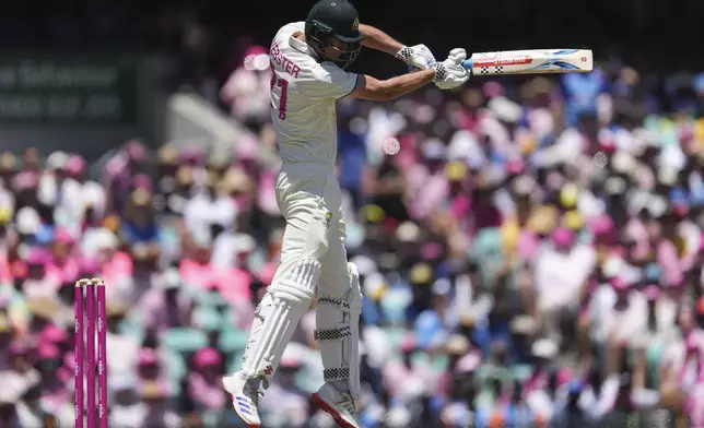 Australia's Beau Webster bats during play on the third day of the fifth cricket test between India and Australia at the Sydney Cricket Ground, in Sydney, Australia, Sunday, Jan. 5, 2025. (AP Photo/Mark Baker)