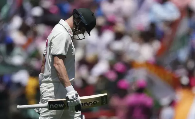 Australia's Steve Smith reacts after he was dismissed during play on the third day of the fifth cricket test between India and Australia at the Sydney Cricket Ground, in Sydney, Australia, Sunday, Jan. 5, 2025. (AP Photo/Mark Baker)