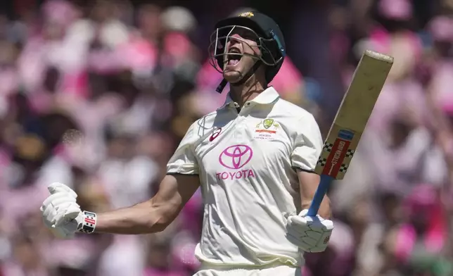 Australia's Beau Webster celebrates after hitting the winning runs during play on the third day of the fifth cricket test between India and Australia at the Sydney Cricket Ground, in Sydney, Australia, Sunday, Jan. 5, 2025. (AP Photo/Mark Baker)