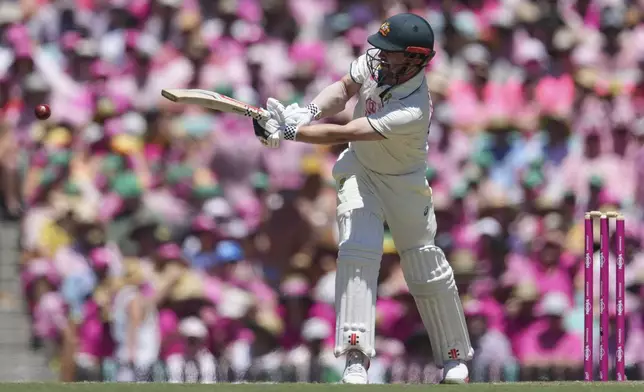 Australia's Travis Head bats during play on the third day of the fifth cricket test between India and Australia at the Sydney Cricket Ground, in Sydney, Australia, Sunday, Jan. 5, 2025. (AP Photo/Mark Baker)