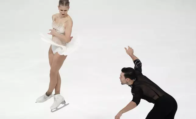 Minerva Fabienne Hase and Nikita Volodin of Germany perform in the pairs free skating during the ISU European Figure Skating Championships in Tallinn, Estonia, Thursday, Jan. 30, 2025. (AP Photo/Sergei Grits)