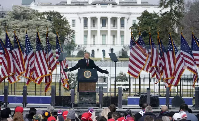 FILE - With the White House in the background, President Donald Trump speaks at a rally in Washington, Jan. 6, 2021. (AP Photo/Jacquelyn Martin, File)