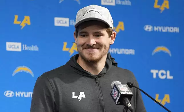 Los Angeles Chargers quarterback Justin Herbert speaks at a news conference after an NFL football game against the Las Vegas Raiders in Las Vegas, Sunday, Jan. 5, 2025. (AP Photo/John Locher)