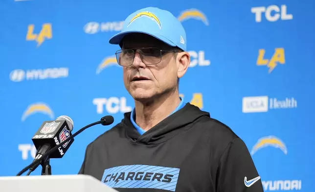 Los Angeles Chargers head coach Jim Harbaugh speaks at a news conference after an NFL football game against the Las Vegas Raiders in Las Vegas, Sunday, Jan. 5, 2025. (AP Photo/John Locher)