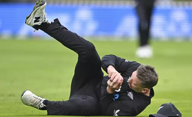 New Zealand's Michael Bracewell takes a catch to dismiss Sri Lanka's Janith Liyanage during the first ODI international cricket match between New Zealand and Sri Lanka at the Basin Reserve in Wellington, New Zealand Sunday, Jan. 5, 2025. (Kerry Marshall/Photosport via AP)