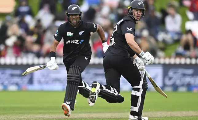 New Zealand's Rachin Ravindra and Will Young play during the first ODI international cricket match between New Zealand and Sri Lanka at the Basin Reserve in Wellington, New Zealand Sunday, Jan. 5, 2025. (Kerry Marshall/Photosport via AP)