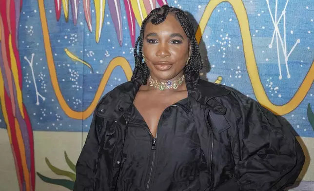 Venus Williams arrives for the Christian Dior Haute Couture Spring Summer 2025 collection, that was presented in Paris, Monday, Jan. 27, 2025. (AP Photo/Lewis Joly).