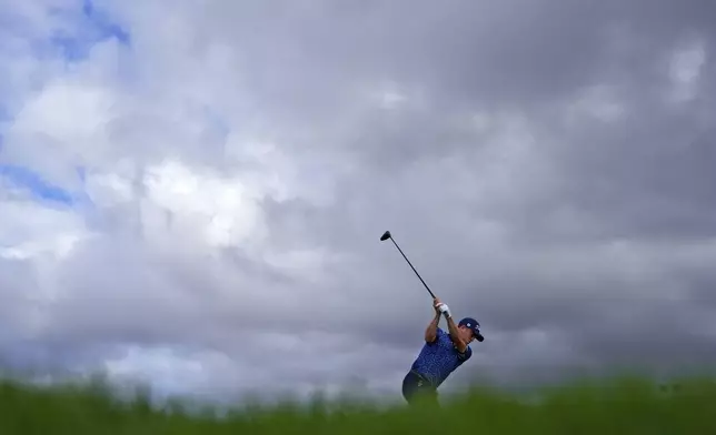 Justin Thomas hits from the 13th tee during the first round of The Sentry golf event, Thursday, Jan. 2, 2025, at Kapalua Plantation Course in Kapalua, Hawaii. (AP Photo/Matt York)