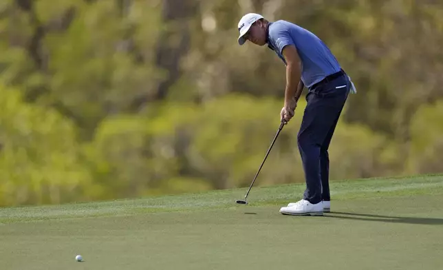 Tom Hoge putts on the 18th green during the first round of The Sentry golf event, Thursday, Jan. 2, 2025, at Kapalua Plantation Course in Kapalua, Hawaii. (AP Photo/Matt York)