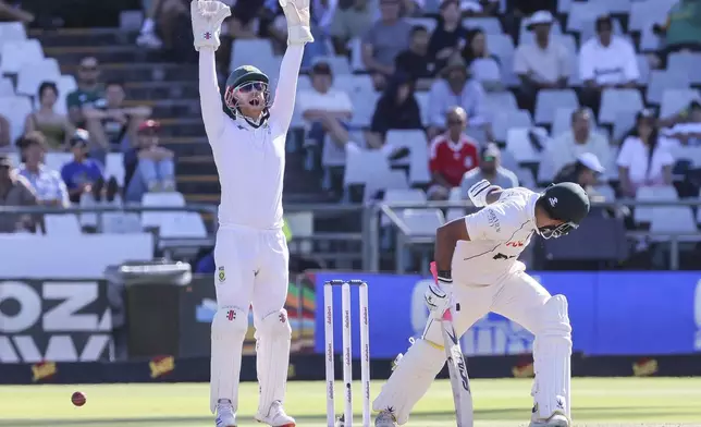 South Africa's Kyle Verreynne appeals for the wicket of Pakistan's Aamir Jamal during the fourth day of the second test match between South Africa and Pakistan in Cape Town, South Africa, Monday, Jan. 6, 2025. (AP Photo/Halden Krog)