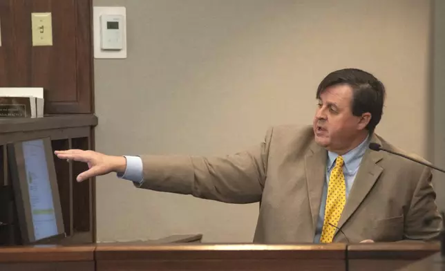 David McLaughlin, a career prosecutor and former assistant attorney general, testifies Thursday, Jan. 30, 2025, in Brunswick, Ga., about a conflict letter that is in front of him on a screen during former Brunswick District Attorney Jackie Johnson’s trial. (Terry Dickson/The Brunswick News via AP, Pool)