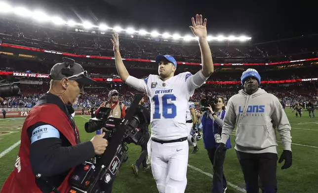 Detroit Lions quarterback Jared Goff (16) walks off the field after a win over the San Francisco 49ers in an NFL football game Monday, Dec. 30, 2024, in Santa Clara, Calif. (AP Photo/Jed Jacobsohn)