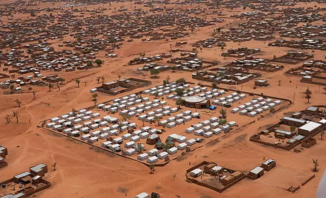 FILE - An aerial view shows a camp of internally displaced people in Djibo, Burkina Faso, May 26, 2022. (AP Photo/Sam Mednick, File)