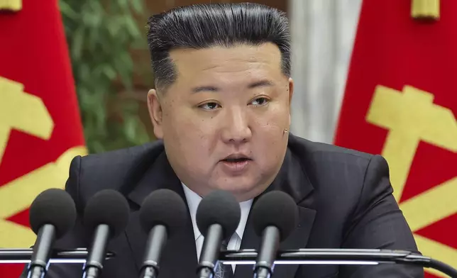 In this photo provided by the North Korean government, North Korean leader Kim Jong Un delivers a speech at a meeting held during Dec. 23 until Dec. 27, 2024, in Pyongyang, North Korea. Independent journalists were not given access to cover the event depicted in this image distributed by the North Korean government. The content of this image is as provided and cannot be independently verified. (Korean Central News Agency/Korea News Service via AP)